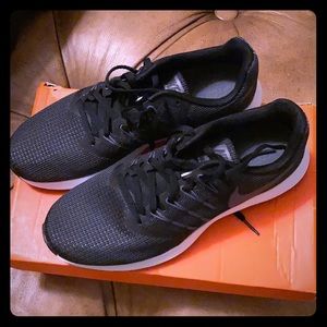 Nike black with black stripes athletic shoes